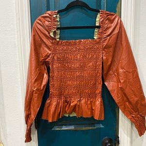 Rustic orange leather blouse